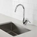 Chrome Faucet Kitchen Focus.webp
